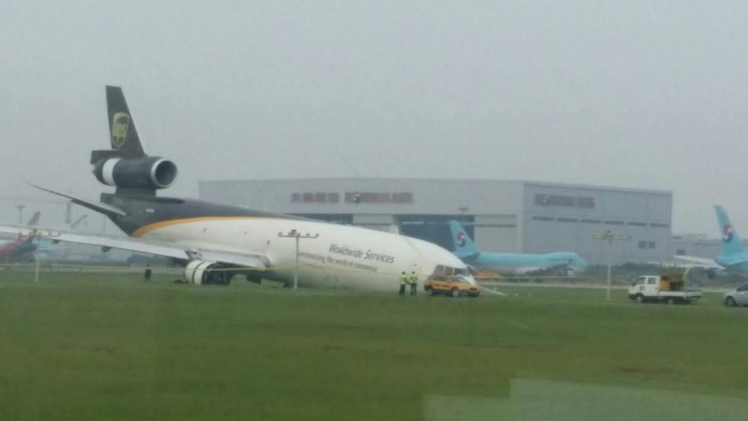 EMERGENCY UPS MD11F nose gear collapsed at Seoul yesterday AIRLIVE