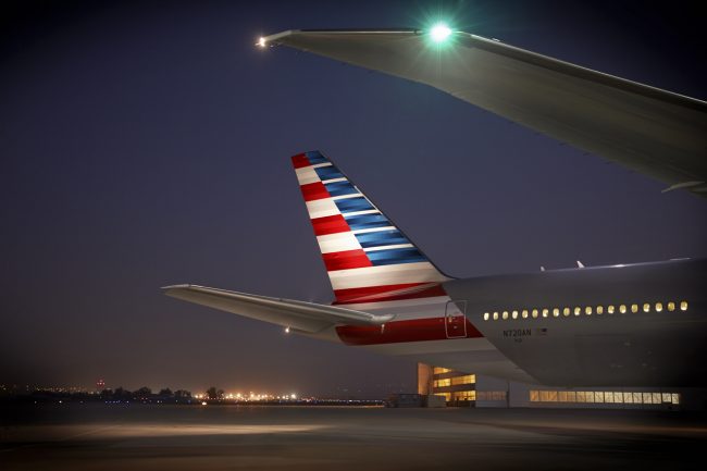 American Airline 777 tail outside at night