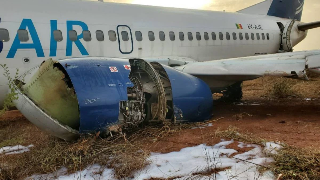 A TransAir Boeing 737 crashed and caught fire, injuring 11 people